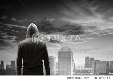 Silhouette of man in hoody Silhouette of man in hoody 101846411
