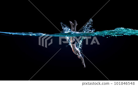 Professional man swimmer on a wave Professional man swimmer on a wave 101846548