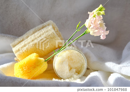 Scrub, loofah washcloth and organic sea sponge on the towel. Scrub, loofah washcloth and organic sea sponge on the towel. 101847988