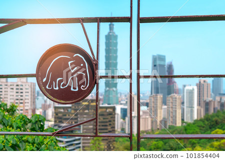 elephant shaped fence with Taipei city from Elephant Mountain or Xiangshan, landmark and popular attractions. Taiwan Travel, vacation and Trip concept elephant shaped fence with Taipei city from Elephant Mountain or Xiangshan, landmark and popular attractions. Taiwan Travel, vacation and Trip concept 101854404
