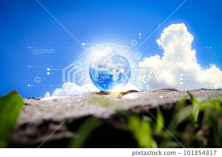 Globe on ground and grass with blue sky and cloud background 101854817
