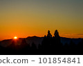 sunset over mountains 101854841