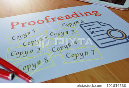 proofreading paper on wooden table 101854888