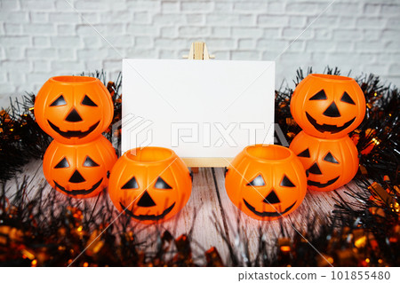 Halloween Pumpkin bucket  with space copy on wooden background 101855480
