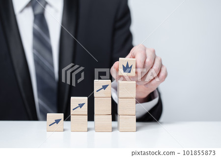 Wooden blocks with black arrows, leadership, carieer business concept 101855873