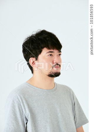 The upper body of a bearded Japanese man in his 30s looking to the right on a white background The upper body of a bearded Japanese man in his 30s looking to the right on a white background 101856593