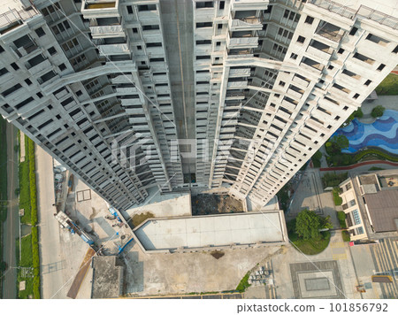 Aerial view of multistory apartment construction site in China 101856792