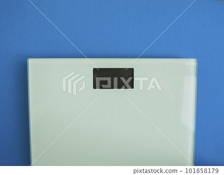 Electronic scales on a blue background 101858179
