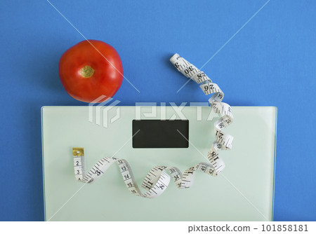 Electronic scales, centimeter tape and tomato Electronic scales, centimeter tape and tomato 101858181