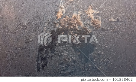 Frost and sun background. Frost texture on the window glass in winter. Ice Crystals in Winter Blue and Pink. 101858462
