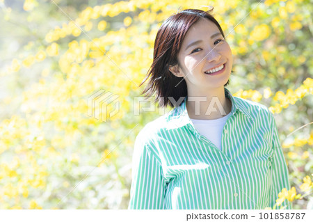 A woman walking in the park 101858787