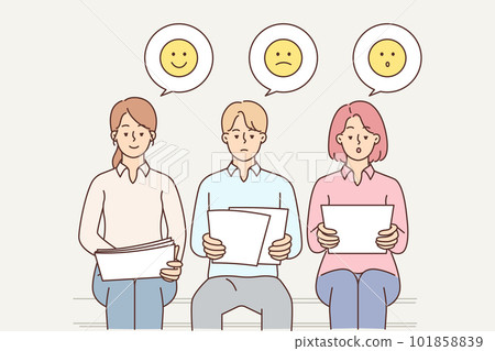 Focus group people sit with pieces of paper giving objective feedback on product quality 101858839