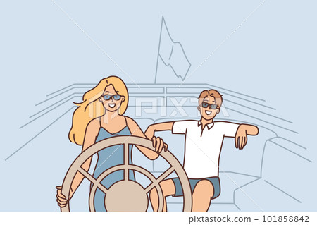 Couple in love rides on yacht spending honeymoon on luxury voyage by sea or ocean 101858842