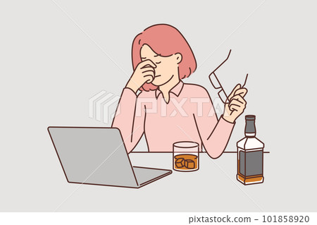 Businesswoman drinks whiskey sitting near laptop and feeling stressed after company goes bankrupt Businesswoman drinks whiskey sitting near laptop and feeling stressed after company goes bankrupt 101858920