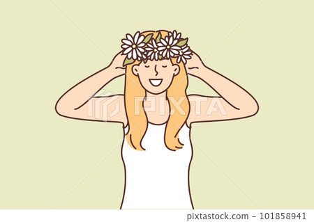 Woman puts on head wreath of spring flowers collected in meadow and rejoices at onset warm weather Woman puts on head wreath of spring flowers collected in meadow and rejoices at onset warm weather 101858941