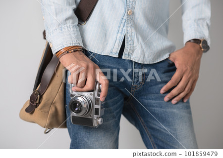 Retro camera in hand 101859479