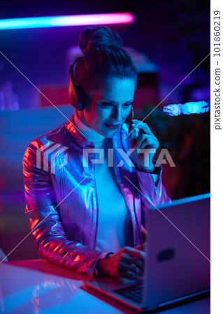 smiling stylish business woman having video conference 101860219