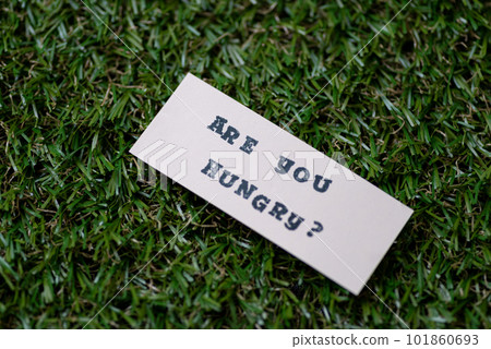 A tag stamped with "ARE YOU HUNGRY?" 101860693