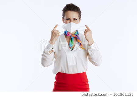 modern female stewardess on white wearing ffp2 mask modern female stewardess on white wearing ffp2 mask 101861125