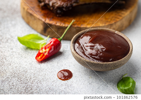 Barbecue sauce in a saucer 101862576
