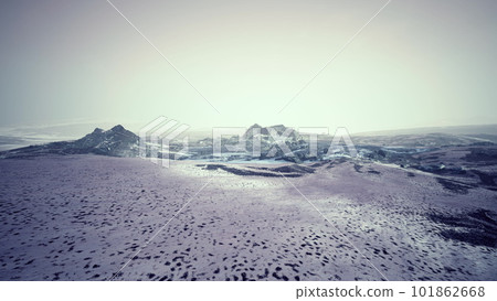 Dramatic winter dark desert steppe on a highland mountain plateau Dramatic winter dark desert steppe on a highland mountain plateau 101862668