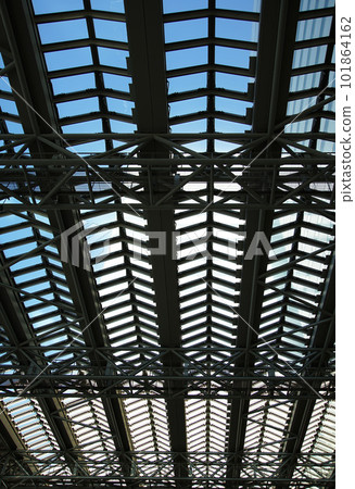 Glass roof and steel frame on a sunny day Glass roof and steel frame on a sunny day 101864162