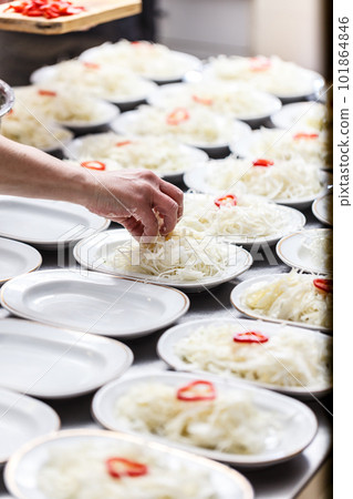 Chopped cabbage in a white plates 101864846