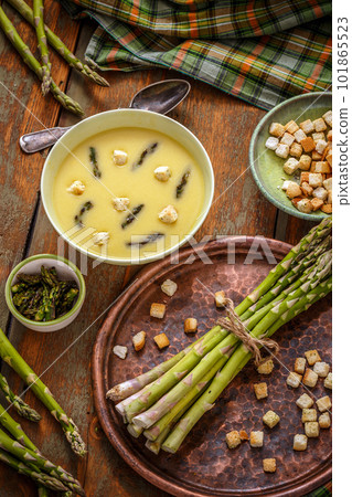 Homemade asparagus cream soup Homemade asparagus cream soup 101865523