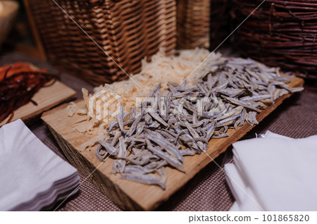 Various types of fish snacks on the festive table. Anchovies 101865820