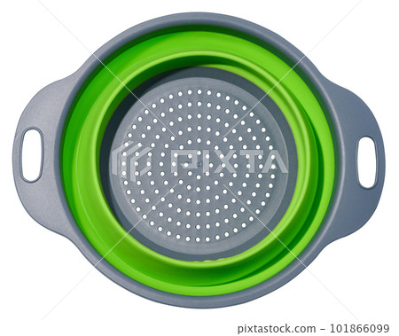 Plastic green collapsible colander on white isolated background Plastic green collapsible colander on white isolated background 101866099