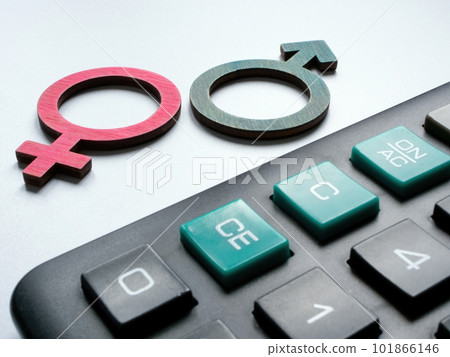 Gender pay gap concept. Male and female signs next to the calculator. Gender pay gap concept. Male and female signs next to the calculator. 101866146