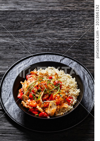 sweet and sour chicken with veggies and rice 101866192