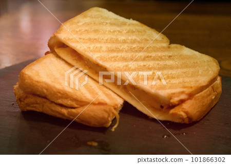 Hot sandwich with ham and cheese Hot sandwich with ham and cheese 101866302
