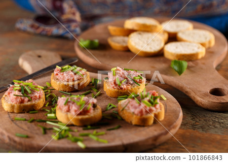 German teewurst on a slice of bruschetta German teewurst on a slice of bruschetta 101866843