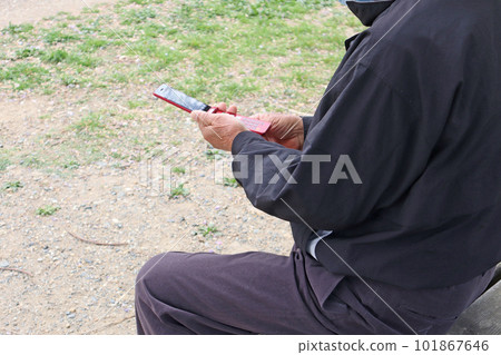 Senior man 2 operating Garake 101867646