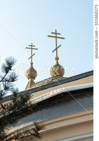 SHYMKENT, KAZAKHSTAN - JANUARY 24, 2023: Orthodox crosses on the temple in honor of the icon of the Kazan Mother of God, Kazakhstan SHYMKENT, KAZAKHSTAN - JANUARY 24, 2023: Orthodox crosses on the temple in honor of the icon of the Kazan Mother of God, Kazakhstan 101868273