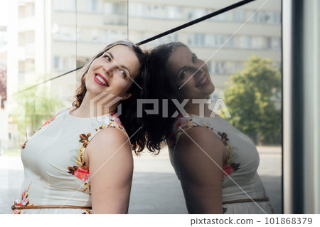 How to Build Self-Confidence. Preparing Yourself for Success. Raising low self-esteem. Portrait of beautiful successful and confident plus size woman How to Build Self-Confidence. Preparing Yourself for Success. Raising low self-esteem. Portrait of beautiful successful and confident plus size woman 101868379