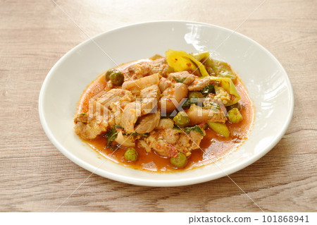 spicy stir fried slice pork leg with eggplant curry on plate spicy stir fried slice pork leg with eggplant curry on plate 101868941