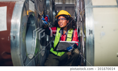 Foreman or worker work at factory site check up machine or products in site 101870014