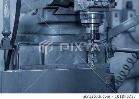 The drilling process on NC milling machine with brass material. 101870755