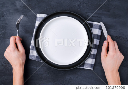 Restaurant and food, the gesture of a human hand on an empty white plate. 101870908