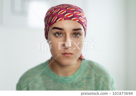 Portrait of unhappy pensive woman with cancer. 101873694