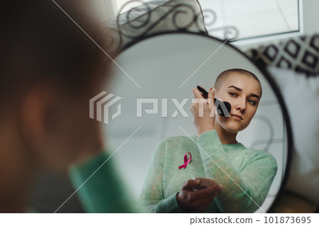 Beauty routine of young woman with cancer. 101873695
