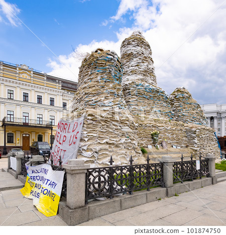 Kyiv, Ukraine - April 24, 2023: Covered monument to Princess Olga, St. Andrew the Apostle, educators Cyril and Methodius with sandbags to protect the historical heritage from Russian attack Kyiv, Ukraine - April 24, 2023: Covered monument to Princess Olga, St. Andrew the Apostle, educators Cyril and Methodius with sandbags to protect the historical heritage from Russian attack 101874750