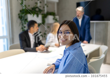 Business partners having negotiations and signing the contract 101875455