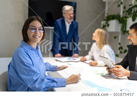 Business partners having negotiations and signing the contract 101875457