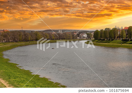 Dramatic sunset lamdscape over Uzh River in Uzhhorod, Ukraine. 101875694