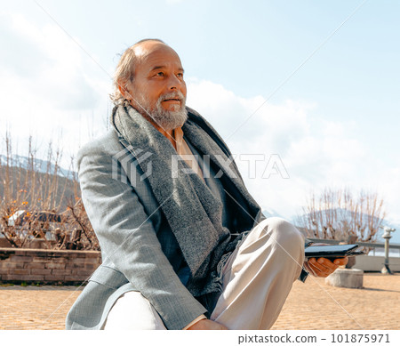 Portrait of a confident, handsome, mature man, pensioner, grandfather in the small town Portrait of a confident, handsome, mature man, pensioner, grandfather in the small town 101875971