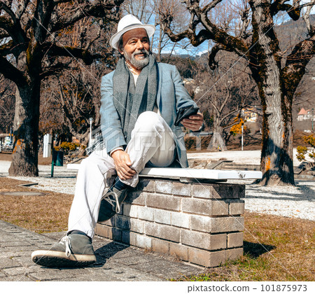Portrait of a confident, handsome, mature man, pensioner, grandfather in the small town Portrait of a confident, handsome, mature man, pensioner, grandfather in the small town 101875973