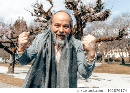 Portrait of a confident, handsome, mature man, pensioner, grandfather in the small town Portrait of a confident, handsome, mature man, pensioner, grandfather in the small town 101876174